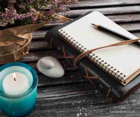 candle and journal